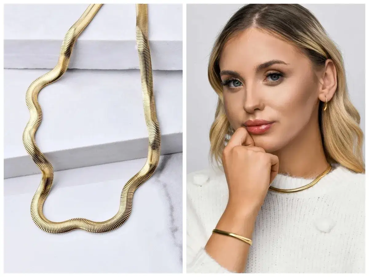 Złota żmijka, naszyjnik i bransoletka, które dodają elegancji.